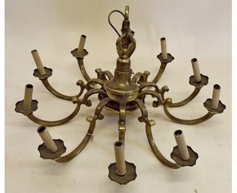 A large heavy brass ten branch chandelier light fitting 