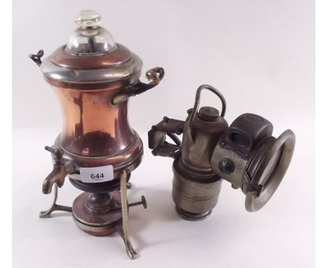 An old car lamp and a coffee perculator 