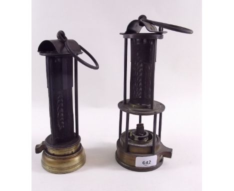An old miners safety lamp by Thomas & Williams Aberdare and another miners lamp