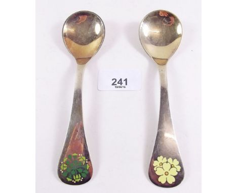 Two Georg Jenson silver gilt and  enamel Year spoons 1985 and 1989