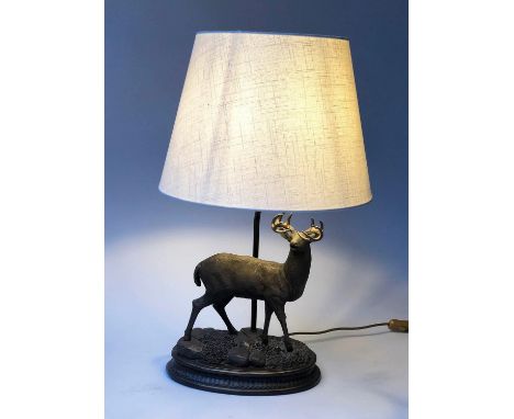 TABLE LAMP, bronzed metal stag with oval base and shade, 70cm H. 