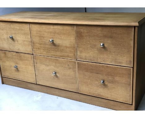 CHEST, 1950's oak with six deep drawers and silvered knobs, 182cm x 61cm x 92cm H. 