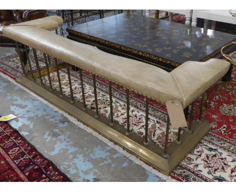 CLUB FENDER, light tan leather seat on a brass base, 162cm x 50cm x 46cm H. (with faults) 