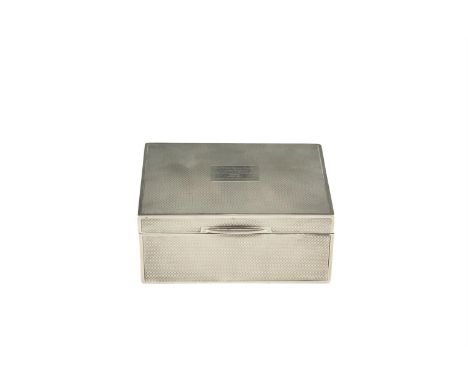 AN EDWARDIAN SILVER RECTANGULAR CIGARETTE CASE, London 1907, with engine turned decoration, engraved 'Captain's Prize, Sutton