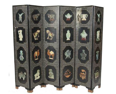 A LARGE CHINESE SIX FOLD INLAID EBON SCREEN, each panel decorated with mother of pearl diamond field and set with four carved