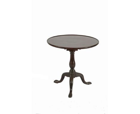 A GEORGE III MAHOGANY CIRCULAR SNAPTOP TEA TABLE, with moulded rim raised on open birdcage and baluster turned centre pillar 