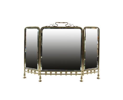 A COPPER AND BRASS FRAMED TRIPTYCH FIRESCREEN, with foldout rectangular panels fitted with bevelled mirror plates. 66cm high;