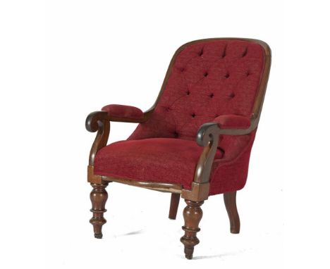 A VICTORIAN MAHOGANY FRAMED UPHOLSTERED ARMCHAIR, c.1840, with arched back covered in crimson button back velour on turned ba