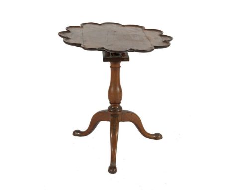 A GEORGE III MAHOGANY SHAPED CIRCULAR SNAPTOP TEA TABLE, with scalloped rim on open birdcage and turned centre pillar and out