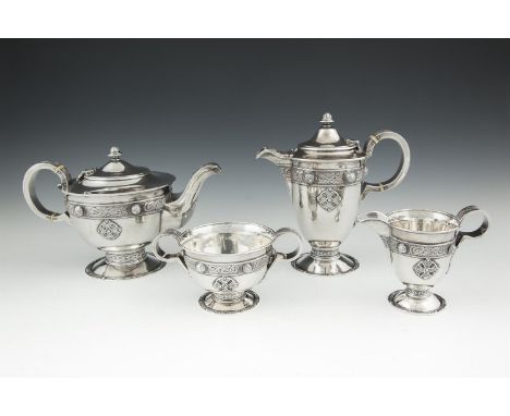 AN IRISH SILVER FOUR PIECE TEA AND COFFEE SERVICE, Dublin 1917, mark of T.W., in the Ardagh pattern, comprising a tea pot, co