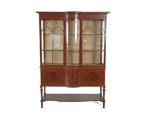 A SET OF EIGHT IRISH GEORGE III MAHOGANY DINING CHAIRS, with shaped pierced ladder backs, the padded seats upholstered in stu