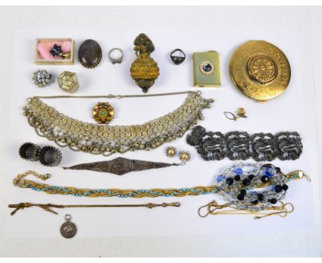 A small group of costume jewellery including two Eastern bracelets and a quartz oval brooch, also a brass figural door knocke