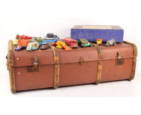 A quantity of playworn 1950s diecast vehicles including Dinky Daimler ambulance, Packard Austin taxi, heavy tractor, etc, Tri