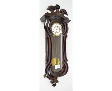 A 19th century stained beech Vienna style wall clock, with two piece white enamel dial, length 89cm (af). CONDITION REPORT: S