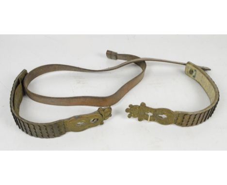 A pair of brass scale articulated shoulder straps and a leather WWI Enfield rifle sling (3).