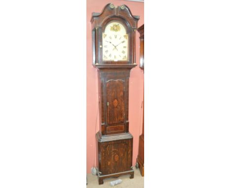 A 19th century oak eight day longcase clock with inlaid conch decoration to plinth and hinged door, with bracket feet, the pa