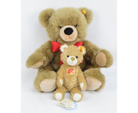 A Steiff "Bobby" bear with light brown fur, length 51cm and a further similar example, length 28cm (2).