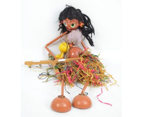 A Pelham Hula dancer puppet, height 80cm. CONDITION REPORT: Wear commensurate with age.