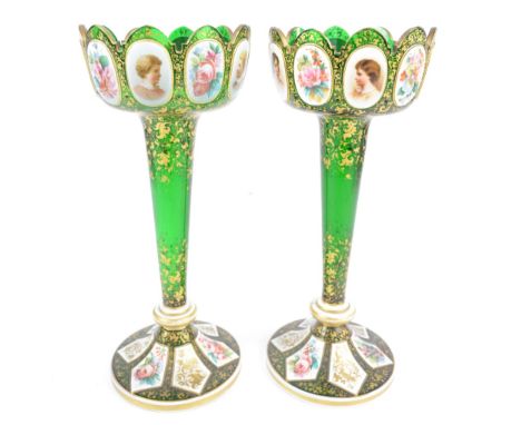 A pair of 19th century Bohemian green glass enamel decorated table lustres, the upper section set with ten oval enamelled cam