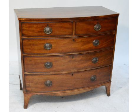 A George IV mahogany and crossbanded bowfront chest of two short above three long drawers on bracket feet, height 109cm, leng