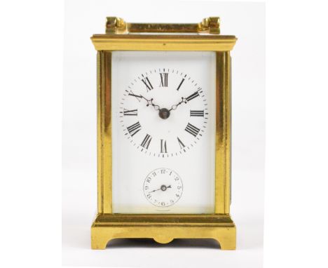 A petit zero time French brass cased carriage clock with swing loop handle and white enamel dial set with Roman numerals and 