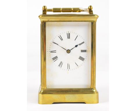 A large late 19th century French brass cased carriage clock with swing loop handle and movement by Henri Jacot, no.9695, with