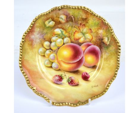 A modern Royal Worcester porcelain shaped circular cabinet plate, hand painted fruit study by S. Wood, signed, diameter 20cm.