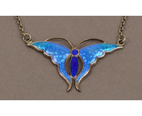 A Charles Horner hallmarked silver pendant in the form of a butterfly, the pierced design having pale blue guilloche enamel w