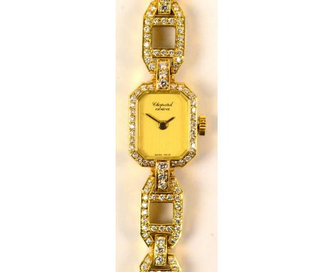 CHOPARD; a lady's 18ct gold diamond set wrist watch, the rectangular dial with canted corners, inscribed "Chopard Geneve", wi