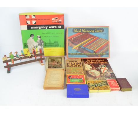 A boxed "Bell's Fun-Packed and Exciting Game", a vintage wool weaving loom, size 3 with manual, a bird shooting target etc, a