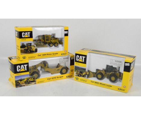 A Cat diecast scale model replicas "Cat 140H Motor Grader", "Cat 631E Scraper" and a "Cat 98G Wheel Loader", boxed (3).