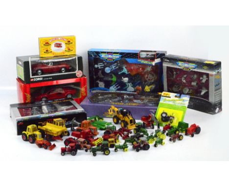 A collection of various die cast Matchbox vehicles, also a boxed 40th anniversary collection commemorative pack, a Corgi 1/18