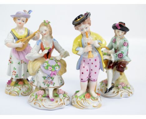 A pair of mid 20th century Sitzendorf porcelain figures of a lady and gentleman picking flowers, marked to bases, height 12cm