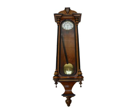 A 19th century walnut and ebonised Vienna triple weight wall clock with two-piece white enamel dial, indistinctly inscribed "