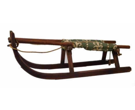 A vintage beech wood framed sledge, length 104cm. CONDITION REPORT: Some worm to lower part of runners.