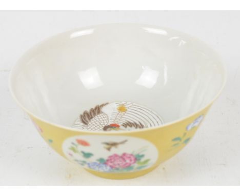 A 19th century Chinese porcelain Famille Jeune circular bowl painted in enamels with four circular reserve depicting birds am