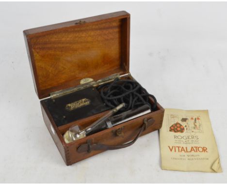 An early 20th century boxed Rogers "Violet-Ray High Frequency Vitalator, The World's Greatest Rejuvenator", no.12972, with ma