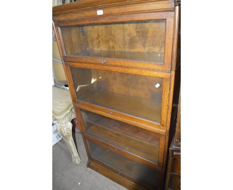 A Globe Wernicke style oak four section bookcase, height 160cm, width 85cm.