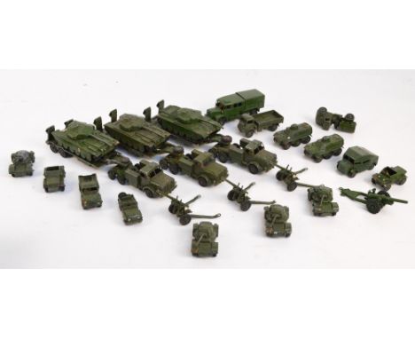 A collection of vintage playworn Dinky military models including 651 Centurion tanks, 660 tank transporter, 689 medium artill