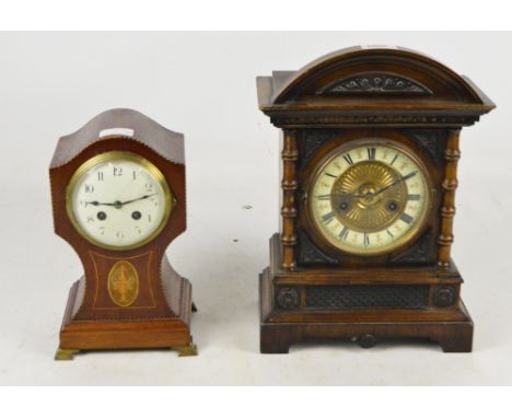 A ca. 1900 German mahogany mantel clock with enamelled dial, with an Edwardian inlaid mahogany example (2).