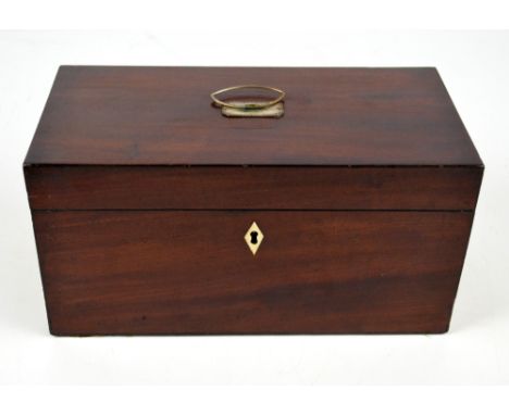 An early 19th century tea caddy of rectangular form with bone lozenge escutcheon, the Moroccan leather lined hinged lid enclo
