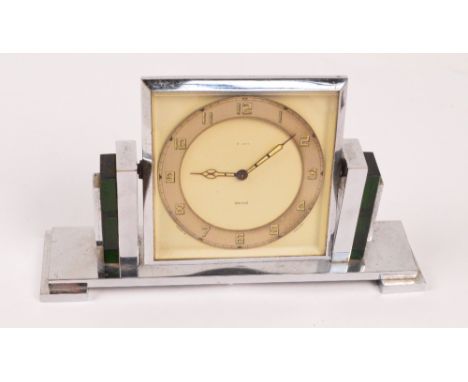 SMITHS; an Art Deco chrome cased eight day mantel clock, the square face with circular chapter ring set with Arabic numerals,
