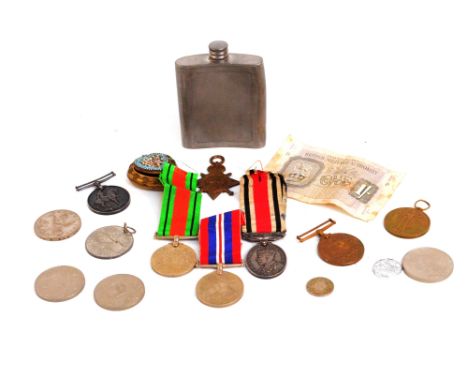 A small collection of medals including WWI British war medal and 1914-15 Star, awarded to "T-805 DVR.E.WHISTON.A.S.C.", and a