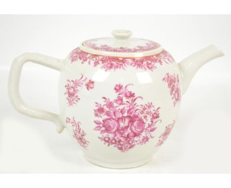 A late 19th century ceramic teapot of globular form, hand painted in puce with floral sprays, with similarly decorated cover,