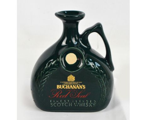 A boxed 750ml ceramic ewer of Buchanan's Red Seal Finest Blended scotch whisky, 15 years old, the ewer is sealed and the stop