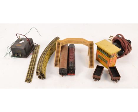 A quantity of playworn Hornby Dublo model trains including an LMS 6917 engine, a Hornby Duchess of Atholl engine with tenders