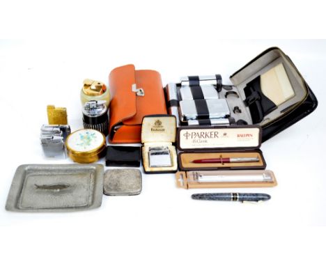 A small mixed lot of collectors' items, onyx table lighter and others, group of pens and two small vanity cases.