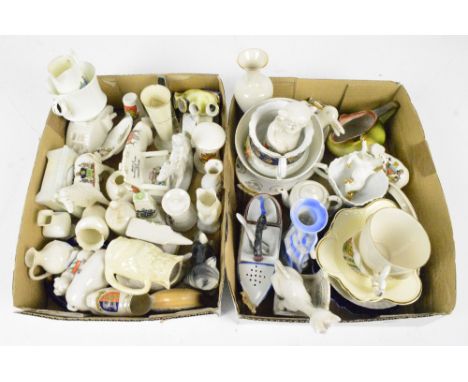 A collection of crested ware and other small ceramic items including pigs, dogs, cats, shoe, anvil, cenotaph etc with example