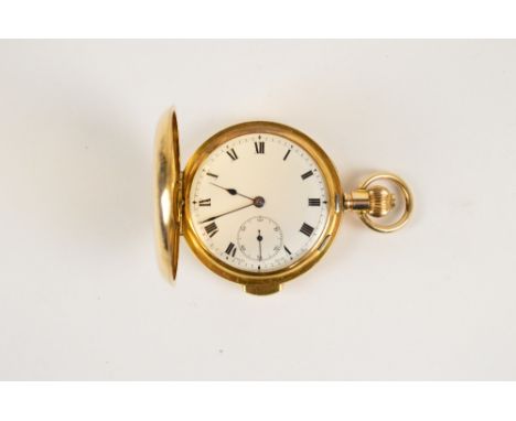 An early 20th century gold plated full hunter crown wind quarter repeating pocket watch, the white enamel dial set with Roman