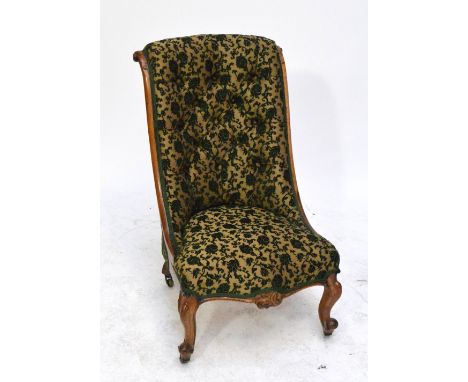A Victorian button upholstered scroll back chair.